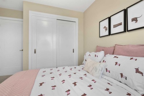 329 Flare Avenue Sw, Diamond Valley, AB - Indoor Photo Showing Bedroom