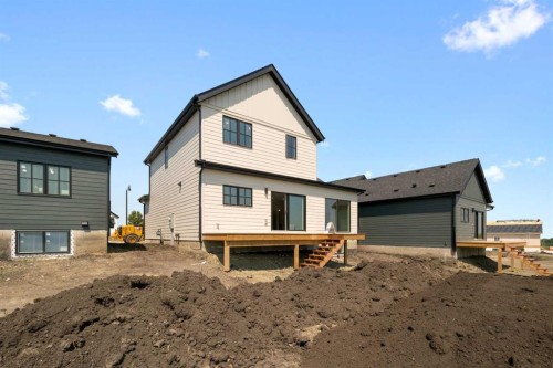 329 Flare Avenue Sw, Diamond Valley, AB - Outdoor With Exterior
