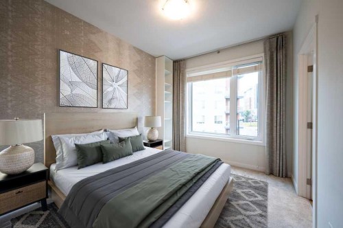 84 Shawnee Common Sw, Calgary, AB - Indoor Photo Showing Bedroom