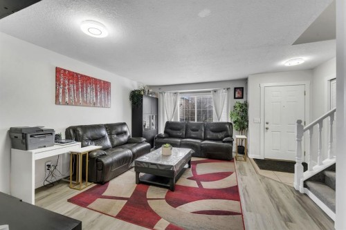 192 Martin Crossing Crescent Ne, Calgary, AB - Indoor Photo Showing Living Room