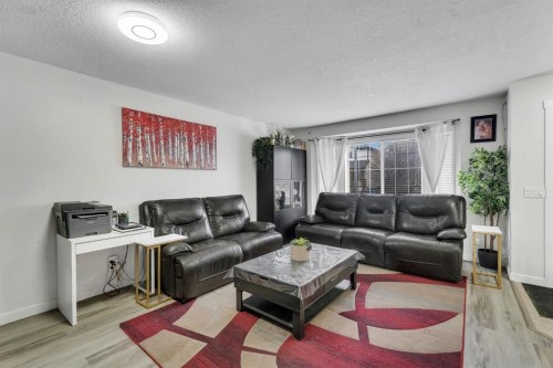 192 Martin Crossing Crescent Ne, Calgary, AB - Indoor Photo Showing Living Room