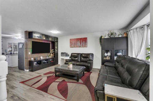 192 Martin Crossing Crescent Ne, Calgary, AB - Indoor Photo Showing Living Room