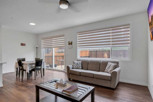 244 Lucas Way Nw, Calgary, AB - Indoor Photo Showing Living Room