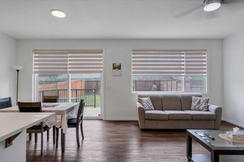 244 Lucas Way Nw, Calgary, AB - Indoor Photo Showing Living Room