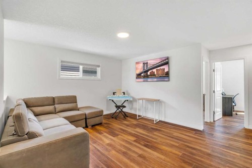 244 Lucas Way Nw, Calgary, AB - Indoor Photo Showing Living Room