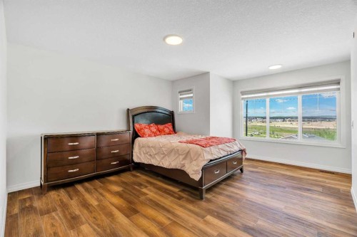 244 Lucas Way Nw, Calgary, AB - Indoor Photo Showing Bedroom