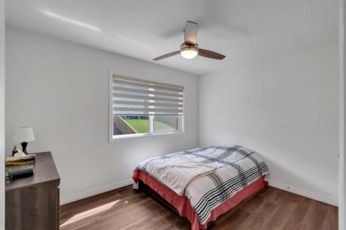244 Lucas Way Nw, Calgary, AB - Indoor Photo Showing Bedroom