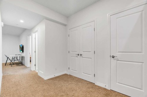 244 Lucas Way Nw, Calgary, AB - Indoor Photo Showing Other Room