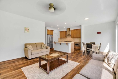 244 Lucas Way Nw, Calgary, AB - Indoor Photo Showing Living Room