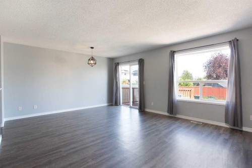 7269 Laguna Way Ne, Calgary, AB - Indoor Photo Showing Other Room