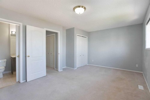 7269 Laguna Way Ne, Calgary, AB - Indoor Photo Showing Other Room