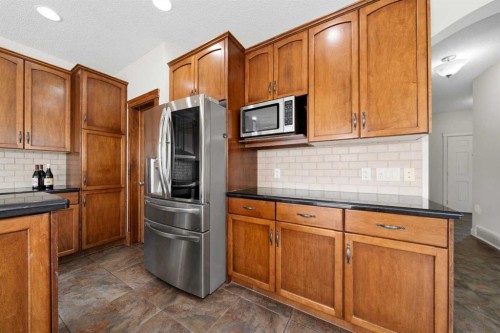 204 Eversyde Mews Sw, Calgary, AB - Indoor Photo Showing Kitchen
