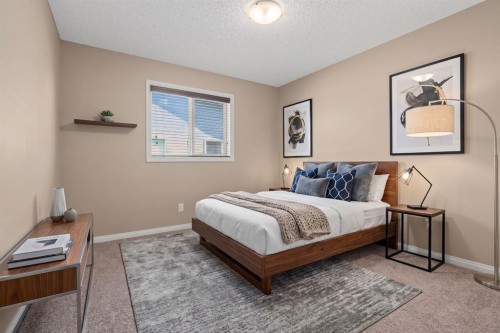164 Aspenmere Close, Chestermere, AB - Indoor Photo Showing Bedroom