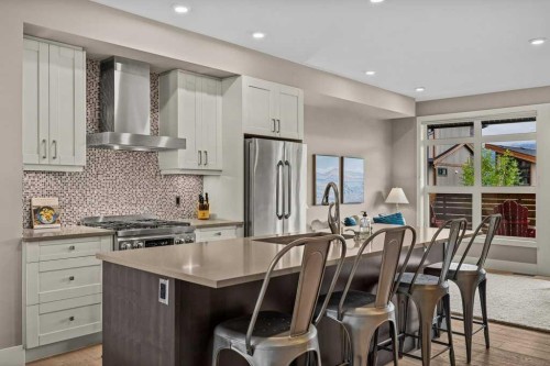418 Riva Heights, Canmore, AB - Indoor Photo Showing Kitchen With Stainless Steel Kitchen With Upgraded Kitchen