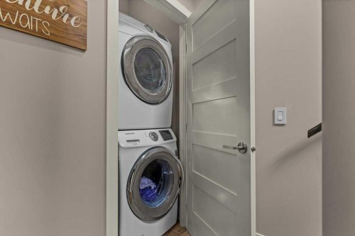 418 Riva Heights, Canmore, AB - Indoor Photo Showing Laundry Room