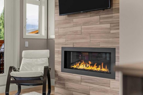 418 Riva Heights, Canmore, AB - Indoor Photo Showing Living Room With Fireplace