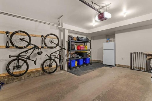 418 Riva Heights, Canmore, AB - Indoor Photo Showing Garage