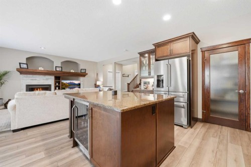274 Autumn Circle Se, Calgary, AB - Indoor Photo Showing Kitchen With Fireplace With Upgraded Kitchen