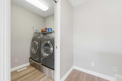 274 Autumn Circle Se, Calgary, AB - Indoor Photo Showing Laundry Room
