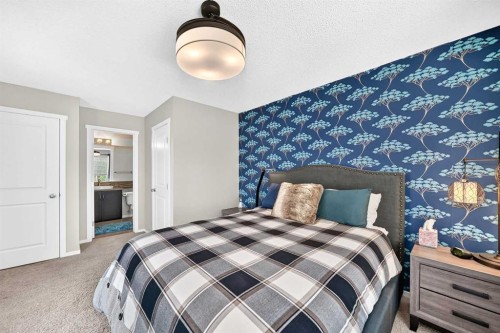 51 Evansview Gardens Nw, Calgary, AB - Indoor Photo Showing Bedroom
