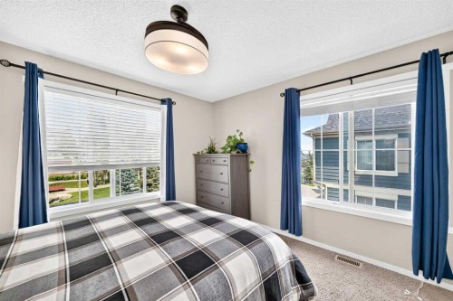 51 Evansview Gardens Nw, Calgary, AB - Indoor Photo Showing Bedroom