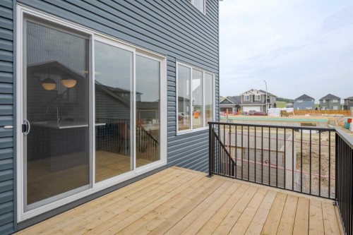 96 Fireside Common, Cochrane, AB - Outdoor With Deck Patio Veranda With Exterior