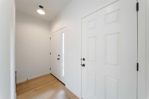 96 Fireside Common, Cochrane, AB - Indoor Photo Showing Other Room