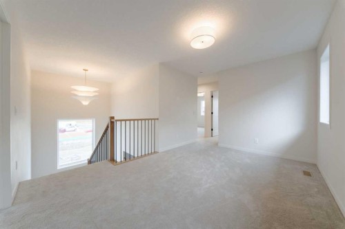96 Fireside Common, Cochrane, AB - Indoor Photo Showing Other Room