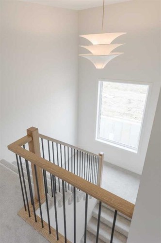 96 Fireside Common, Cochrane, AB - Indoor Photo Showing Other Room