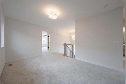 96 Fireside Common, Cochrane, AB - Indoor Photo Showing Other Room