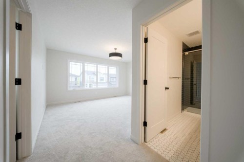 96 Fireside Common, Cochrane, AB - Indoor Photo Showing Other Room