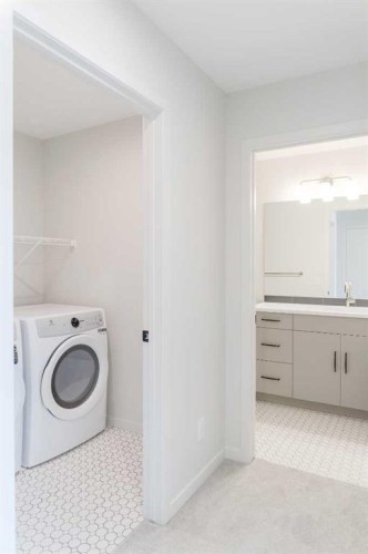 96 Fireside Common, Cochrane, AB - Indoor Photo Showing Laundry Room