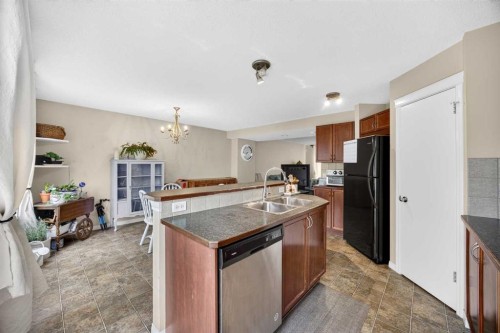 437 Tuscany Drive Nw, Calgary, AB - Indoor Photo Showing Kitchen With Double Sink