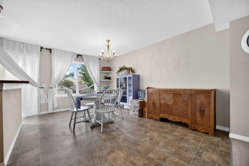 437 Tuscany Drive Nw, Calgary, AB - Indoor Photo Showing Dining Room