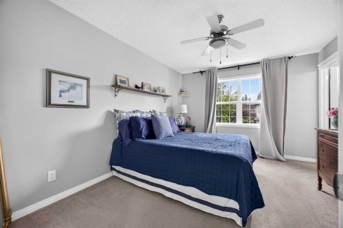 437 Tuscany Drive Nw, Calgary, AB - Indoor Photo Showing Bedroom