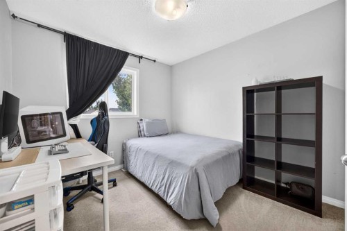 437 Tuscany Drive Nw, Calgary, AB - Indoor Photo Showing Bedroom