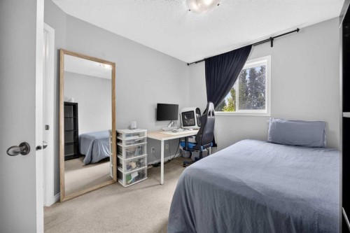437 Tuscany Drive Nw, Calgary, AB - Indoor Photo Showing Bedroom