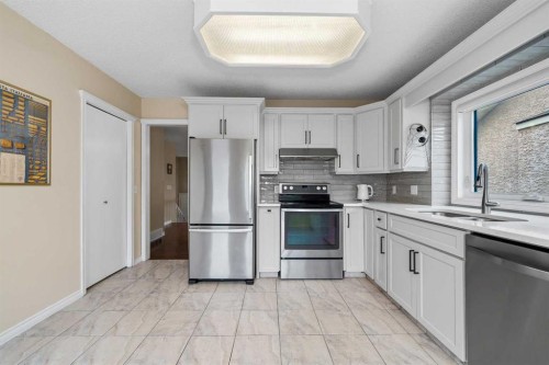 36 Shannon Circle Sw, Calgary, AB - Indoor Photo Showing Kitchen With Stainless Steel Kitchen With Double Sink