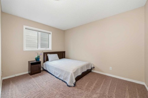 36 Shannon Circle Sw, Calgary, AB - Indoor Photo Showing Bedroom