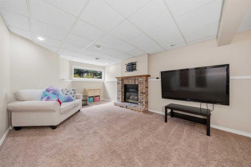 36 Shannon Circle Sw, Calgary, AB - Indoor With Fireplace