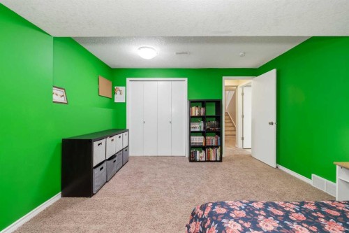 36 Shannon Circle Sw, Calgary, AB - Indoor Photo Showing Bedroom