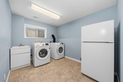 36 Shannon Circle Sw, Calgary, AB - Indoor Photo Showing Laundry Room