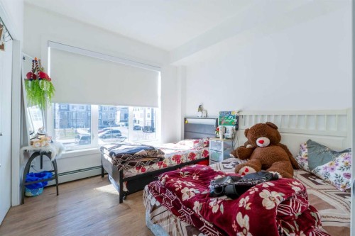 1207-681 Savanna Boulevard Ne, Calgary, AB - Indoor Photo Showing Bedroom