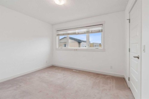 314 Covecreek Circle Ne, Calgary, AB - Indoor Photo Showing Other Room