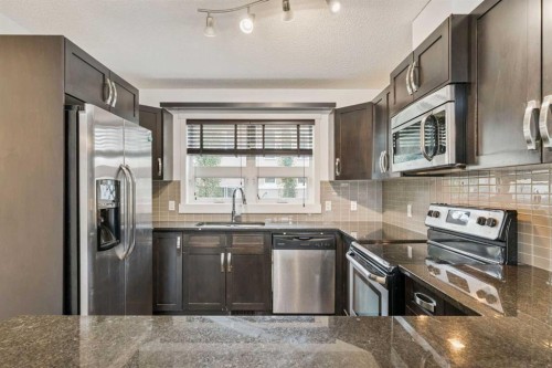 314 Covecreek Circle Ne, Calgary, AB - Indoor Photo Showing Kitchen With Stainless Steel Kitchen With Upgraded Kitchen