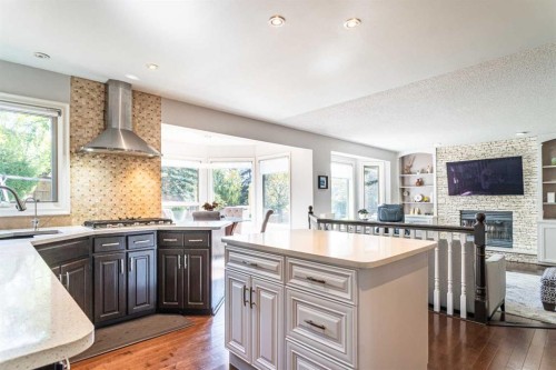 307 Woodhaven Bay Sw, Calgary, AB - Indoor Photo Showing Kitchen With Upgraded Kitchen