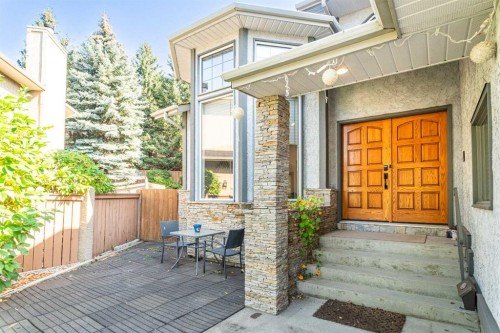 307 Woodhaven Bay Sw, Calgary, AB - Outdoor With Deck Patio Veranda With Exterior