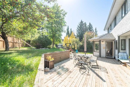 307 Woodhaven Bay Sw, Calgary, AB - Outdoor With Deck Patio Veranda