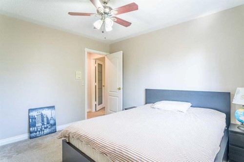 307 Woodhaven Bay Sw, Calgary, AB - Indoor Photo Showing Bedroom