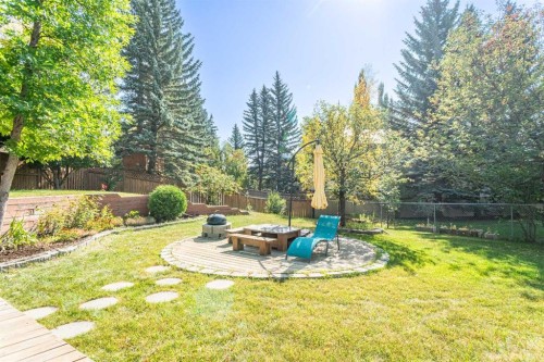 307 Woodhaven Bay Sw, Calgary, AB - Outdoor With Backyard